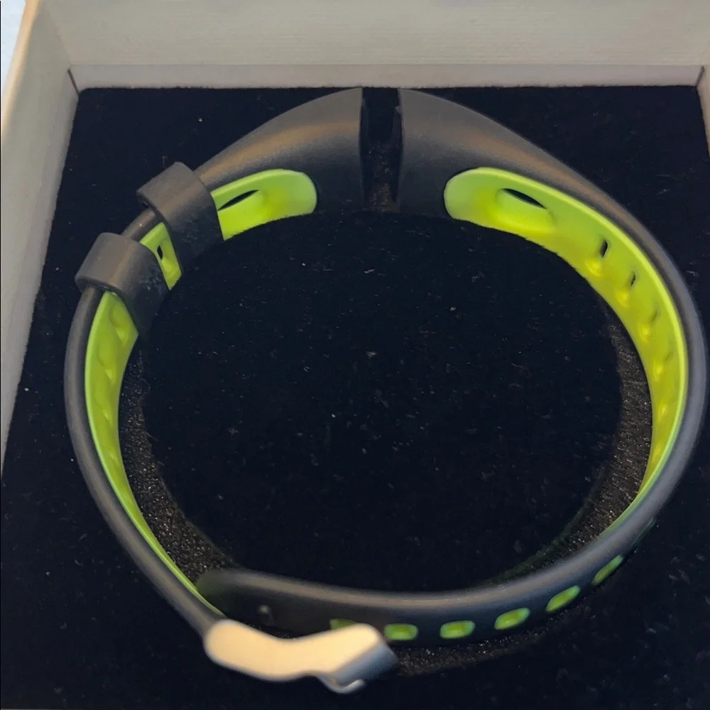 Smart Bracelet with Green and Black Band Replacement.
